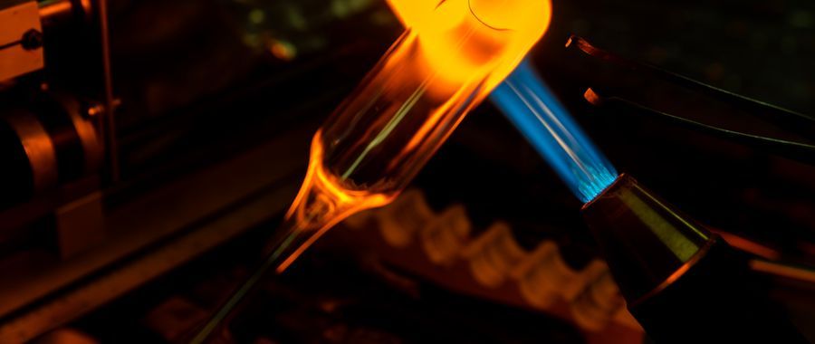 Glassworking near an intensely heated furnace