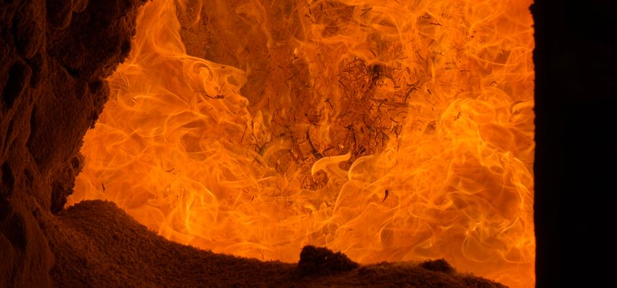 Intense flames inside an industrial furnace — fire bricks are the material that makes industrial high-temperature operations possible