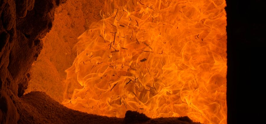 Intense flames inside an industrial furnace answering the question can brick burn by showing the direct flame environment refractory brick is built to handle